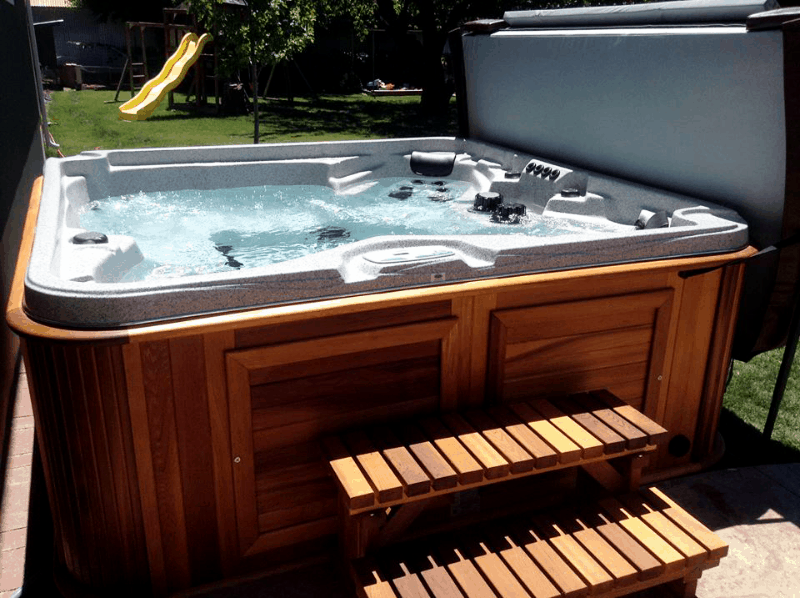 arctic spas hot tub on the backyard